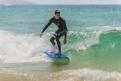 Australian surfer catching a wave