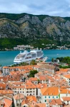 Top view of the Old town and cruise ship in the Bay of Kotor, Montenegro
