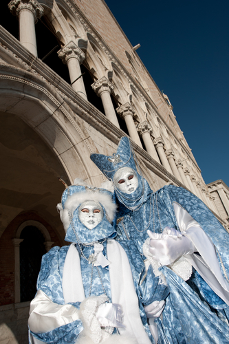 VENICE, ITALY - FEBRUARY 26: Unidentified people in Venetian masks at St. Mark's Square, Carnival of Venice on February 16, 2012 in Venice, Italy. The annual carnival is from February 11 to February 21, 2012.